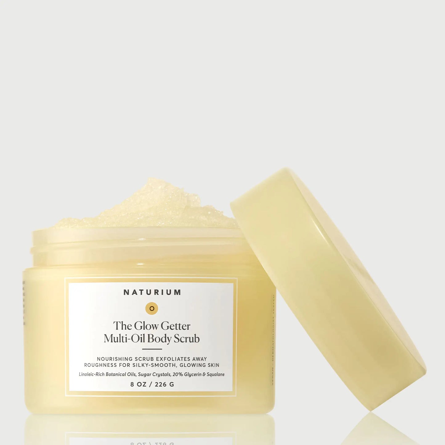 the-glow-getter-multi-oil-body-scrub-u0 NATR-40028-GlowGetter-Multi-Oil-Body-Scrub-Front-CapOff-bonebkgd.webp