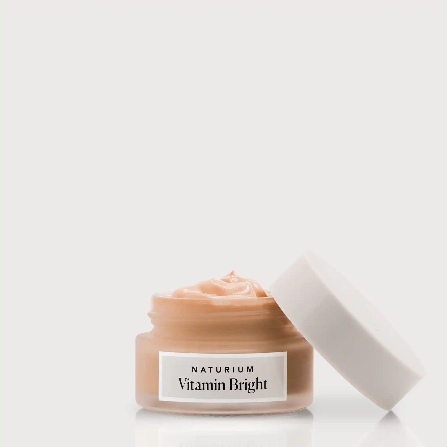 vitamin-bright-illuminating-eye-cream-e9 NATR-VitaminBright_DEEP_Primary_front_openjar_bone.webp