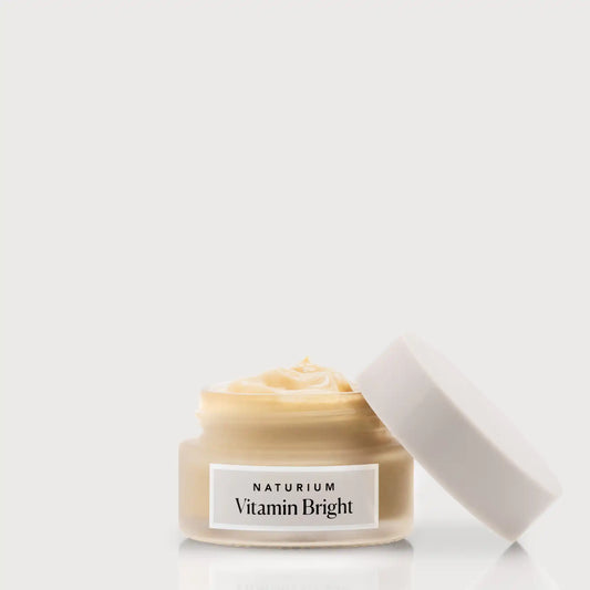 vitamin-bright-illuminating-eye-cream-e9 NATR-VitaminBright_LIGHT_Primary_front_openjar_bone.webp